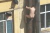 chinese-man-climbs-pipe-to-avoid-prostitution-arrest-07-560x373.jpg