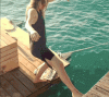 Lady-Fails-To-Skip-From-Raft-To-Land-Does-The-Splits-Into-The-Ocean.gif