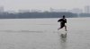 wuhan-china-2011-floods-graduation-photos-01-560x311.jpg