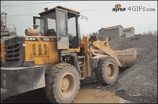 Five-year-old-operates-bucket-loader.gif