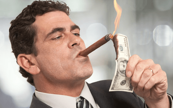 man-smoking-money-cropped-552x345.png